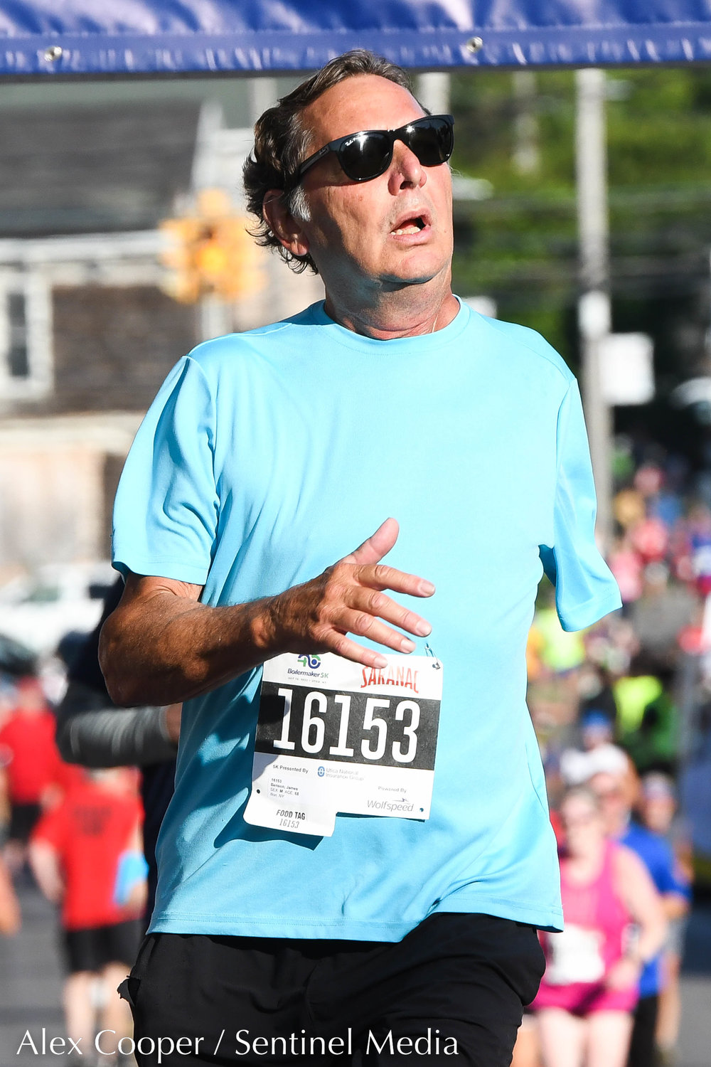 5K runners make their way to the finish line during the 45th Boilermaker Road Race on Sunday.