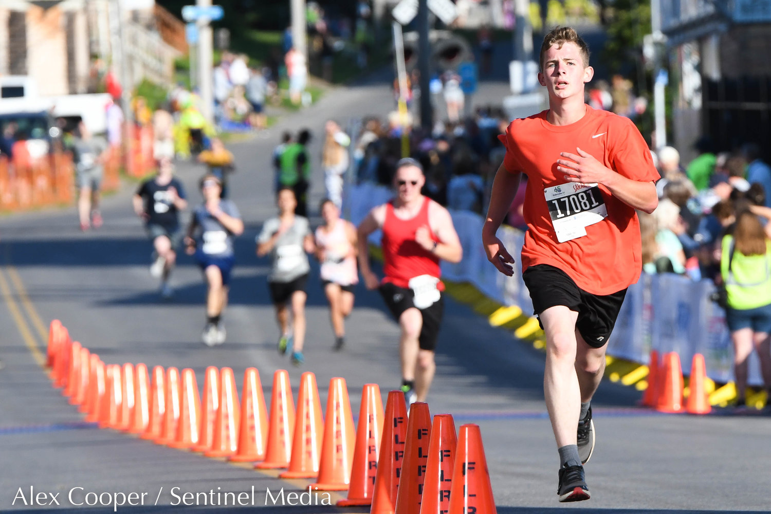 Cold Brook resident Carl Hindley prepares to cross the finish line during the 5K race at the 45th Boilermaker Road Race on Sunday.