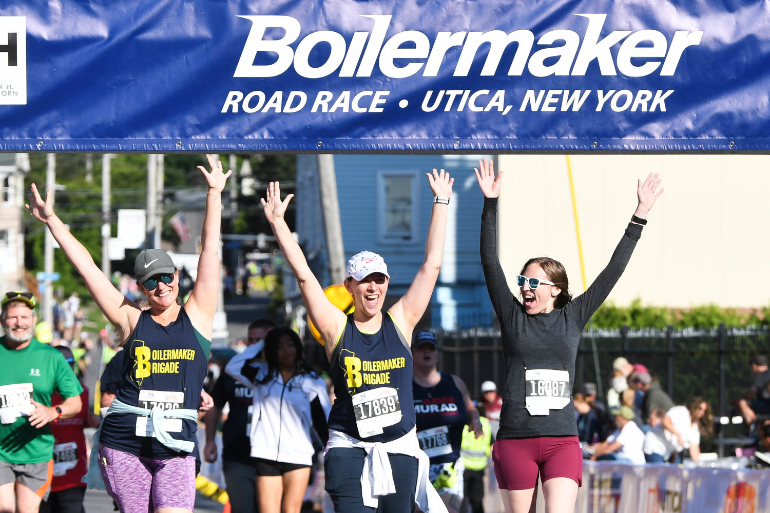 5K runners cross the finish line during the 45th Boilermaker Road Race on Sunday.
