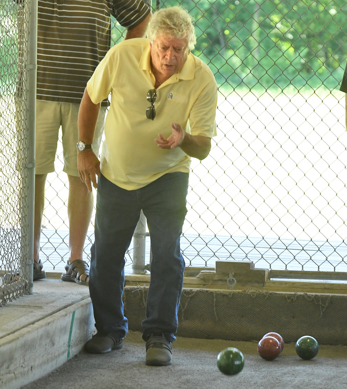 Dave Fiorini makes a shot during the Al Orbinati Memorial Tournament at the Toccolana Club on East Dominick Street Saturday. Players were tuning up for the 47th World Series of Bocce this weekend, also at the club. The event will include 98 Open Division teams and 33 in the Women's Division.