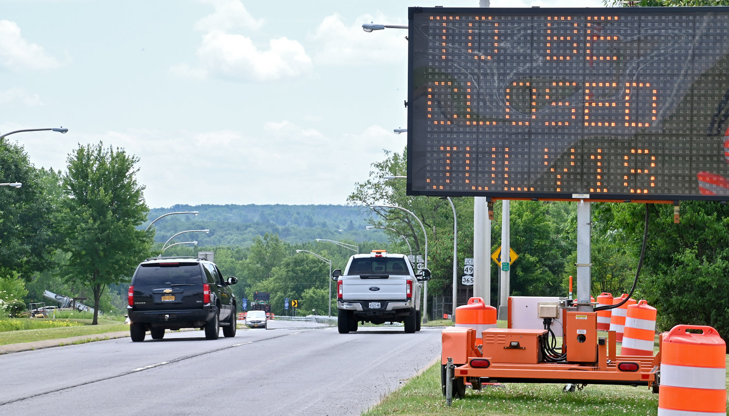 Cars depart the Griffiss Business and Technology Park on Route 825 toward the east and west ramp Wednesday afternoon. The Route 825 bridge over Route 365 will close to traffic at 6 p.m. on Monday, July 18, to facilitate repair work.  The work is expected to be complete in September.