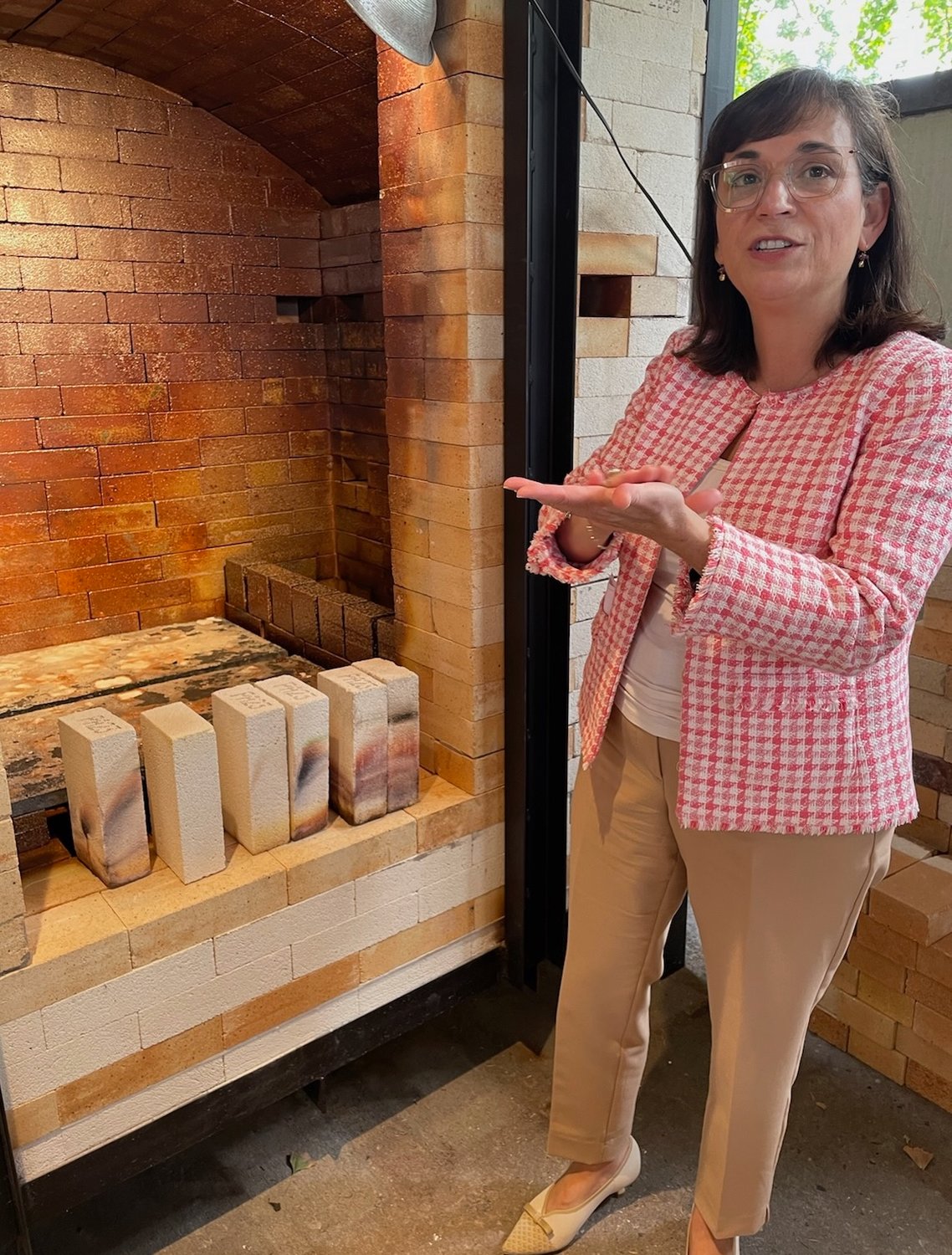 Munson-Williams-Proctor Arts Institute President and CEO Anna T. D’Ambrosio talks about the new salt kiln unveiled outside the ceramics studio Wednesday.