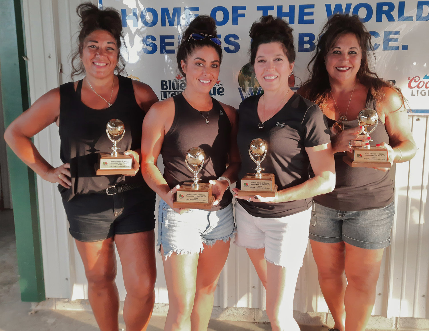 Viviani Law Firm, consisting of sisters Tammy Dimezzo, Kristin Ciotti, Robin Lanzi and Kim Luczak won the women's division of the 47th World Series of Bocce Sunday at sun-drenched Toccolana Club in Rome. Pictured is Viviani Law Firm, holding their trophies.