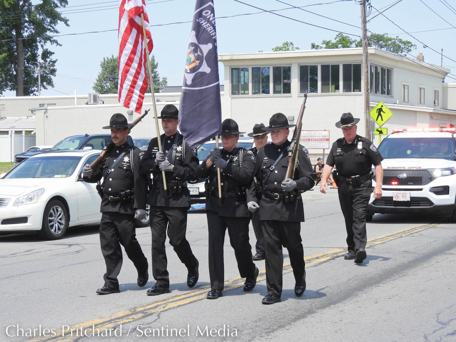 The Sylvan Beach Pirate's Parade makes its way down Main Street. Pictured is the Oneida County Sheriff's Office Color Guard with Oneida County Sheriff Robert Maciol right behind them.