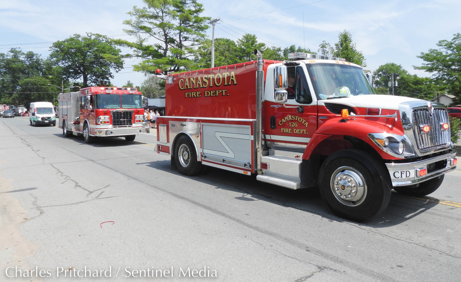 The Sylvan Beach Pirate's Parade makes its way down Main Street. Pictured is the Canastota Fire Department, broadcasting the Wellerman Sea Shanty from their fire engine to the delight of attendees.