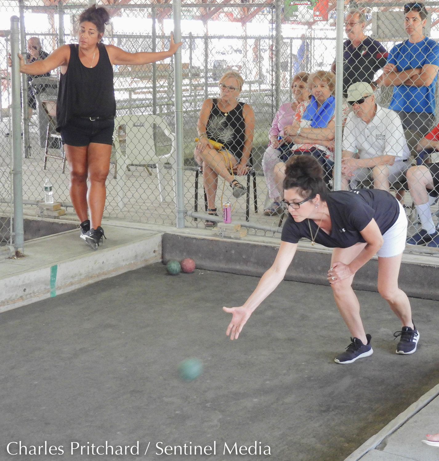 Finalists Toccolana Club and Viviani Law Firm compete in the women's division of the 47th World Series of Bocce Sunday at sun-drenched Toccolana Club in Rome.