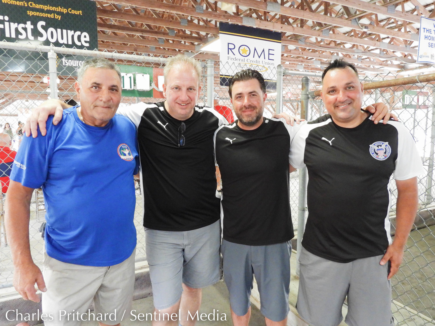 Finalists Tri-State Bocce and Club Vitu Lazio compete in the open division of the 47th World Series of Bocce Sunday at sun-drenched Toccolana Club in Rome. Pictured are the men's division champions, Club Vitu Lazio, comprised of Felice Scala, left, Marco Cignarale, Pete Russo, and Natale Scala.