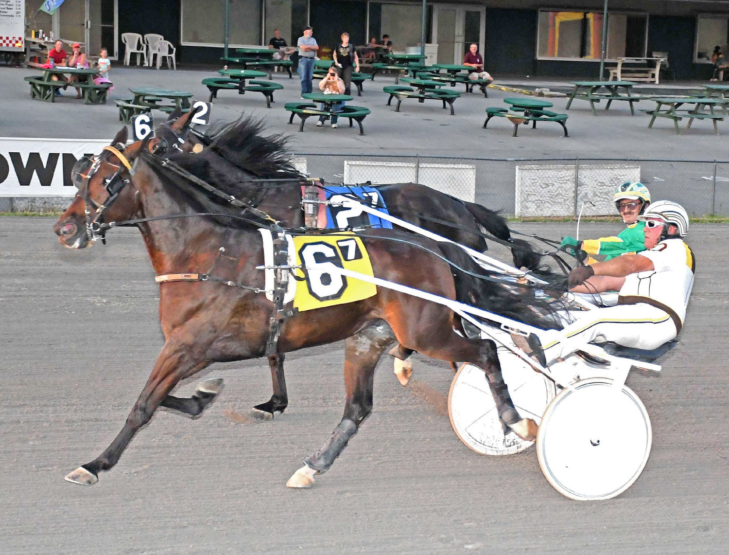 Bourbon Express and driver Howard Okusko Jr. won the $8,800 Open Trot at Vernon Downs Saturday with a late charge. The win was in a season-best 1:54. It was the horse’s second win of the season at 16th career victory.