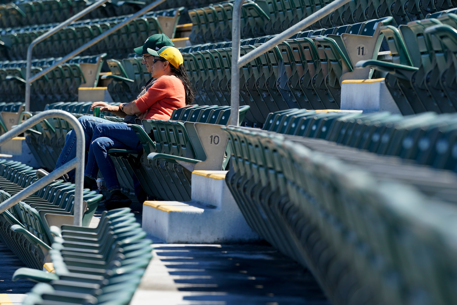 Fans attend the first baseball game of a doubleheader between the Oakland Athletics and the Detroit Tigers in Oakland, Calif., Thursday, July 21, 2022. (AP Photo/Godofredo A. V√°squez)