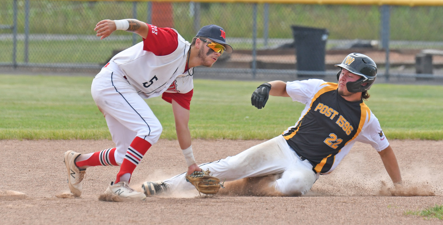 Whitestown Post's Dominic Bullis field a throw from the catcher as Harpursville's Jim Lindsley slides safely in to second Saturday at DeLutis Field in Rome. Whitestown Post won 4-3 to advance in the state Legion tournament. The team is scheduled to play at 10 a.m. Tuesday in Saugerties.