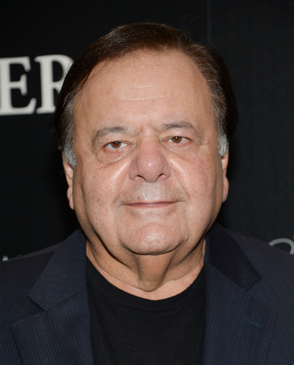 FILE - Paul Sorvino attends a special screening of "Foxcatcher", hosted by the Cinema Society with Details and Brooks Brothers, at The Museum of Modern Art on Tuesday, Nov. 11, 2014, in New York. Sorvino, an imposing actor who specialized in playing crooks and cops like Paulie Cicero in ‚ÄúGoodfellas‚Äù and the NYPD sergeant Phil Cerretta on ‚ÄúLaw &amp; Order,‚Äù has died. He was 83. (Photo by Evan Agostini/Invision/AP, File)