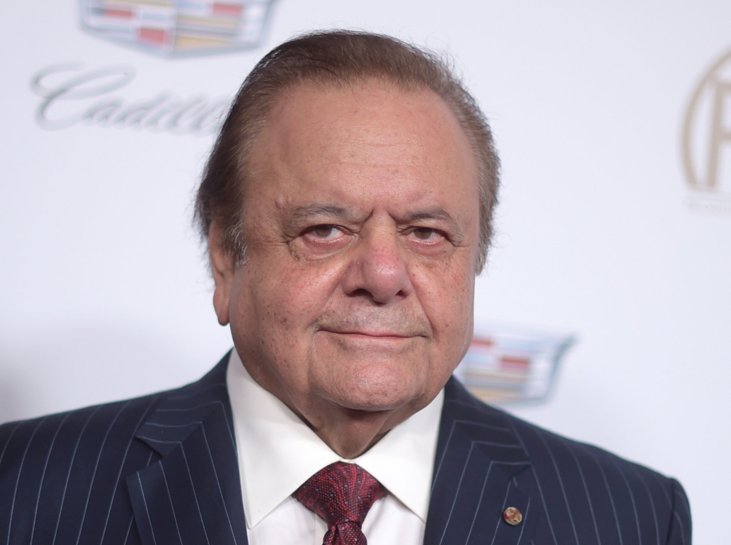 FILE - Paul Sorvino arrives at the 29th annual Producers Guild Awards at the Beverly Hilton on Saturday, Jan. 20, 2018, in Beverly Hills, Calif. Sorvino, an imposing actor who specialized in playing crooks and cops like Paulie Cicero in ‚ÄúGoodfellas‚Äù and the NYPD sergeant Phil Cerretta on ‚ÄúLaw &amp; Order,‚Äù has died. He was 83.  (Photo by Richard Shotwell/Invision/AP, File)