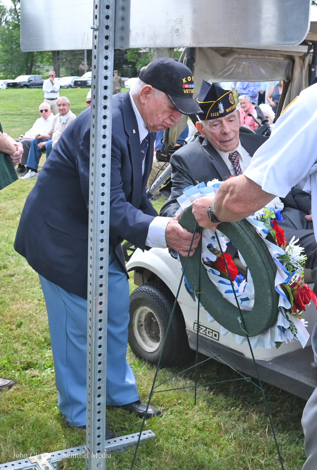 Ceremonial wreath laying at the foot of the Route 365 Korean War dedication marker was part of the Wednesday, July 27 dedication ceremony.