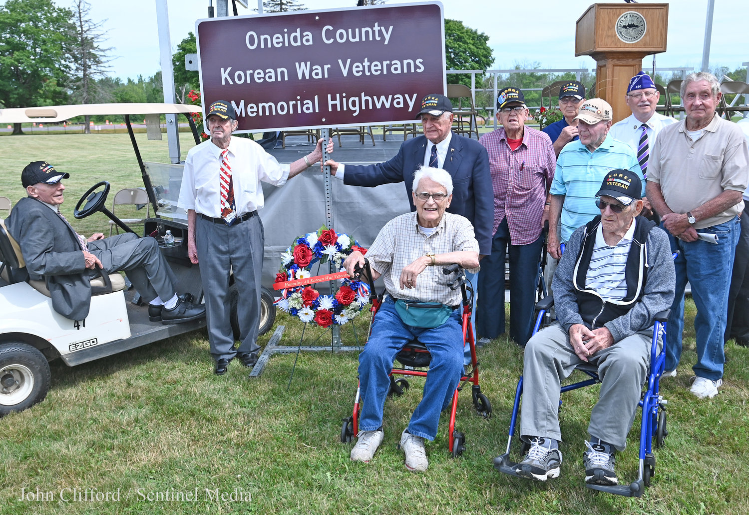 Pictured are Korean War veterans with the new road marker.