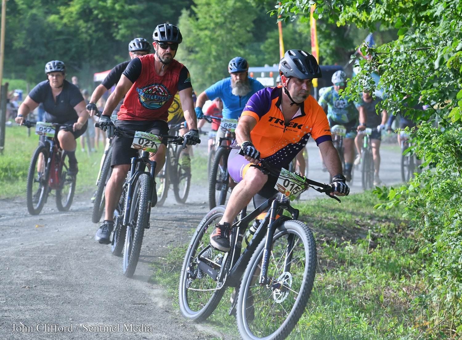Jim Cheyne of Marcy (No. 015) heads into the woods start the half hour Tilden Hill Grinder series bike race in Vernon Wednesday evening.