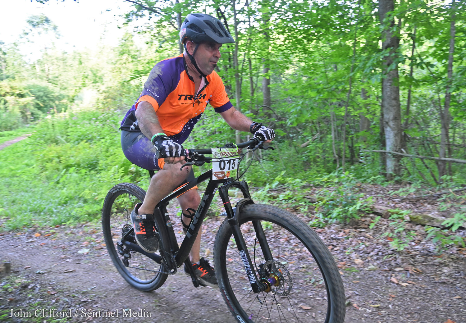 Jim Cheyne of Marcy (No. 015) heads up a hill during the half hour Tilden Hill Grinder series bike race in Vernon Wednesday evening. Cheyne finished second in the race.
