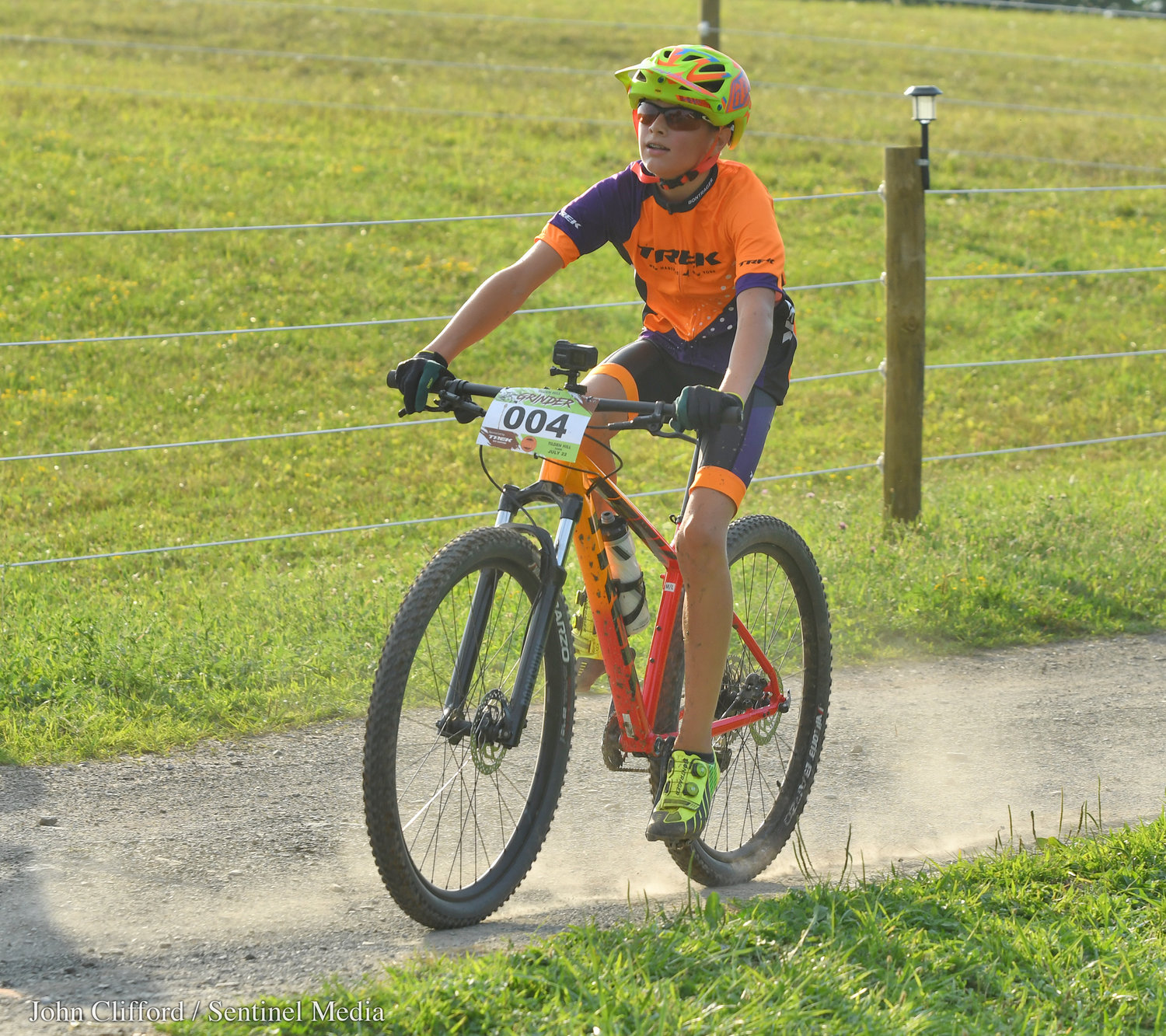 Tilden Hill Grinder series bike racing participant Wyatt Kimball from Sauquoit, pedals to the finish line during the 30 minute race Wednesday night in Vernon.