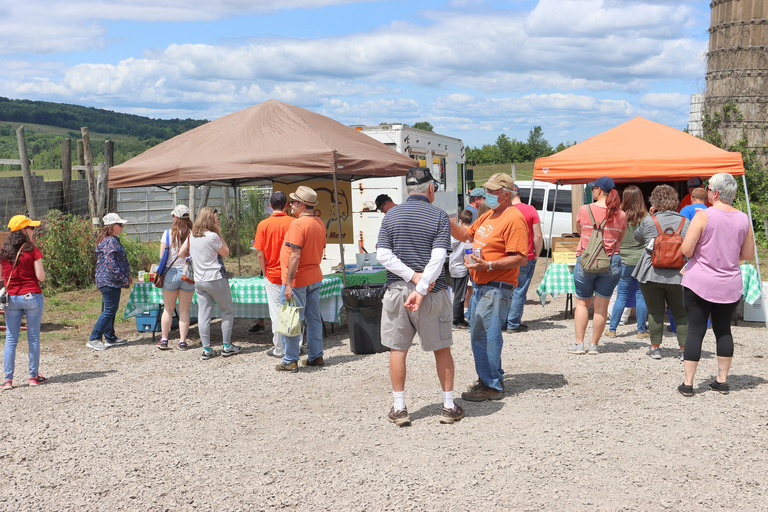 In 2021, crowds gather at Empire Buffalo during Madison County Open Farm Day to learn about the animals and their care.