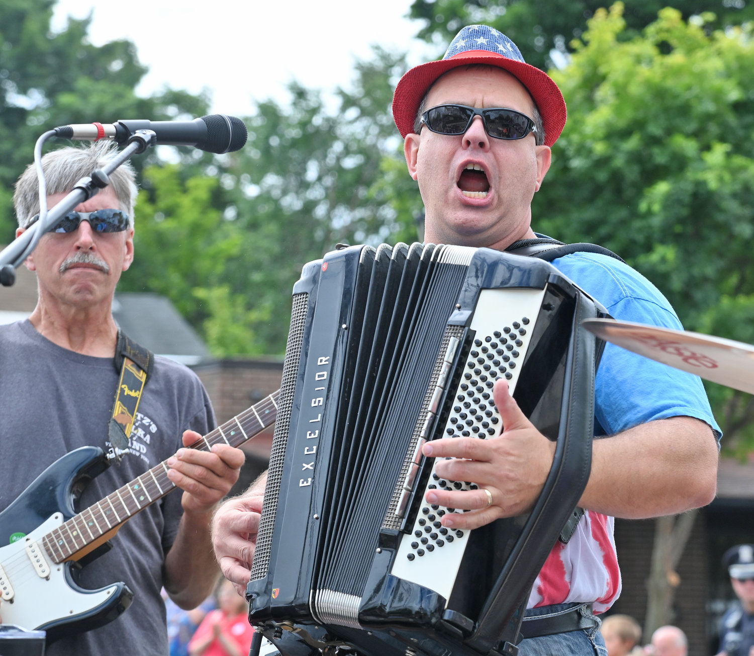 Fritz Scherz and the rest of Fritz’s Polka Band delight the crowd as they perform on a float during Saturday’s parade.