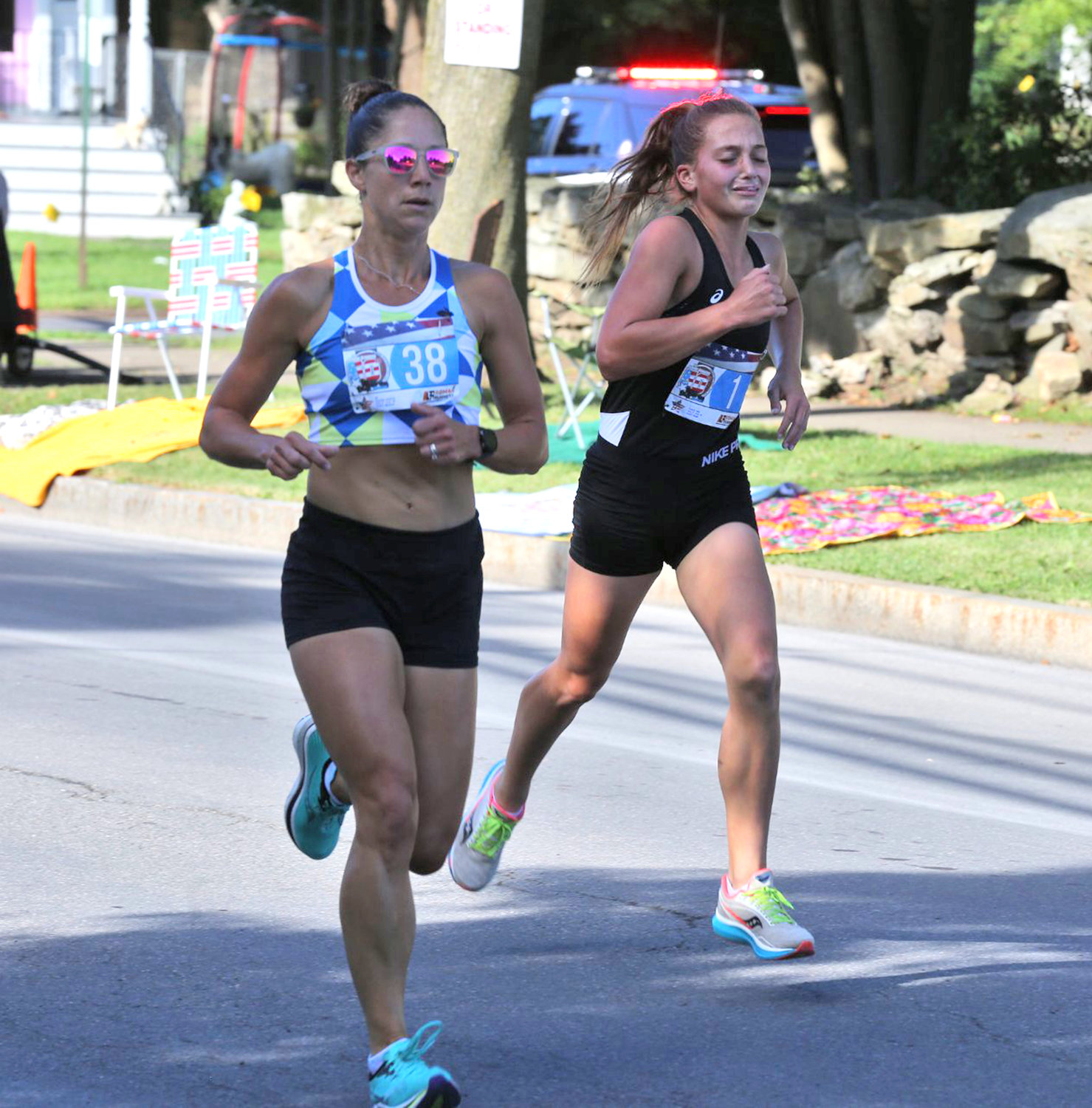 The two top finishers among female runners in Saturday’s Honor America Days 5K parade run in Rome were Jessica Charles, left, of Oriskany and Alex French of New Hartford. Charles was first among female runners and 11th overall in 19:41 and French was second and 13th, respectively, in 19:54.