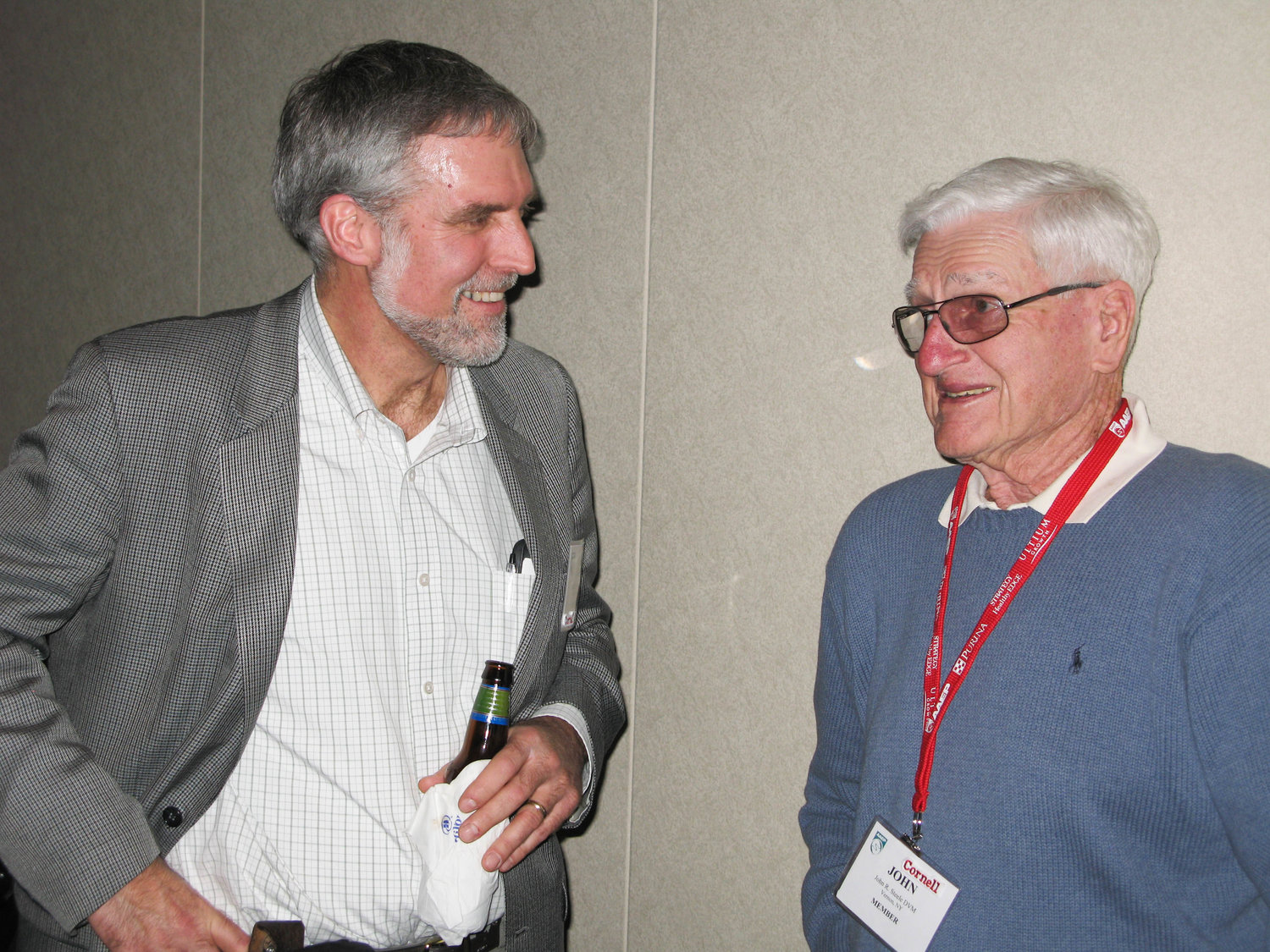 Dirk Vanderwall (left) visits with Dr. John Steele (right) during a Cornell Veterinary School reception at a veterinary conference in 2010. Steele was a veterinarian at Steele Equine Clinic in Vernon who played an essential part in Vanderwall's career.