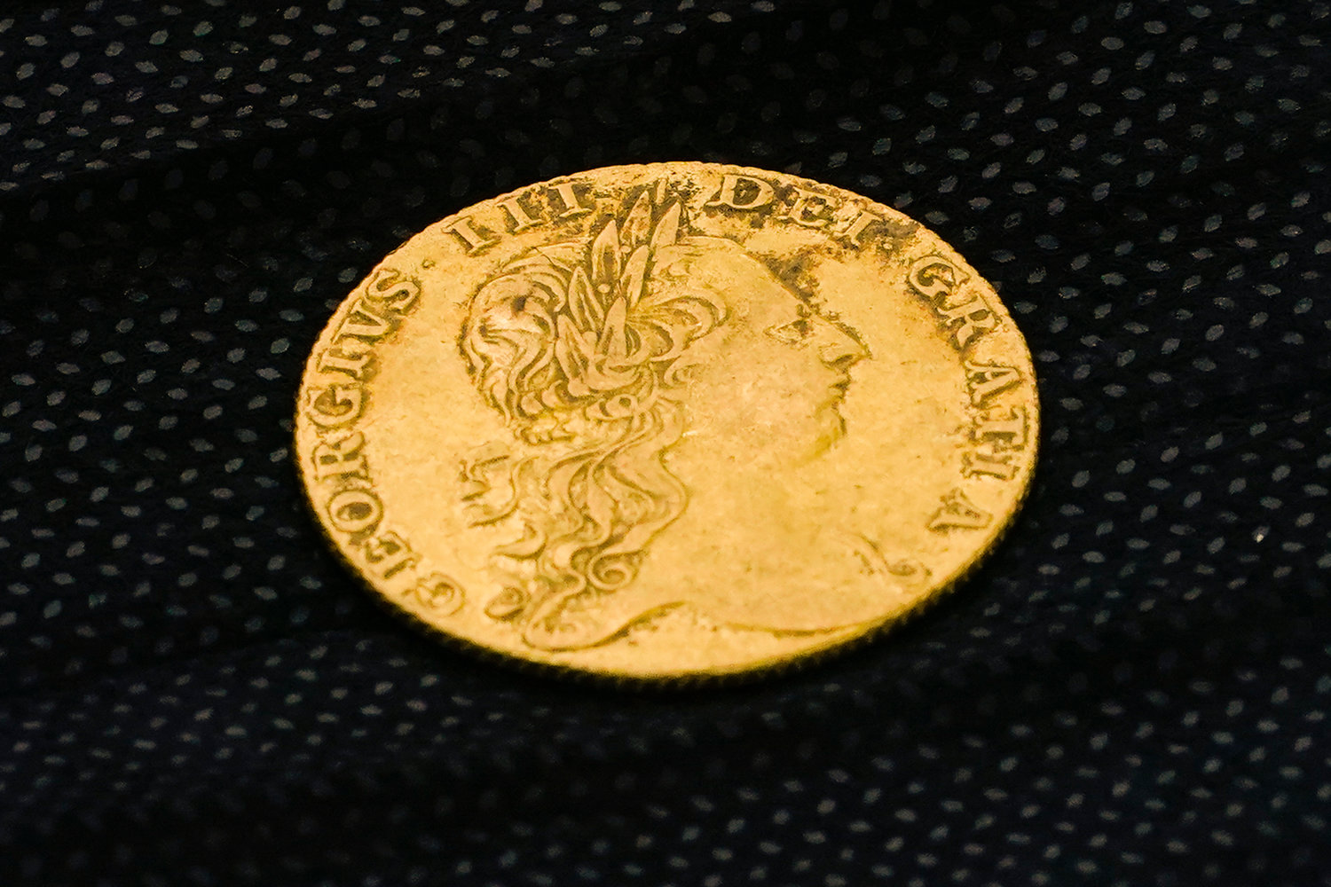 Shown is a King George III gold guinea, discovered in an excavation site at the Red Bank Battlefield Park in National Park, N.J.