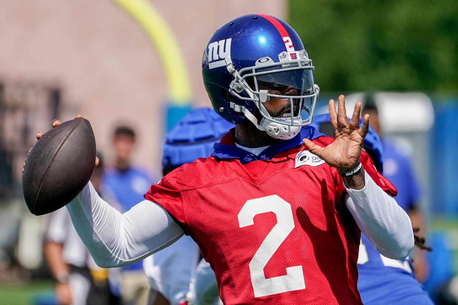 New York Giants quarterback Tyrod Taylor passes during a drill at the team's training camp on July 27 in East Rutherford, N.J.