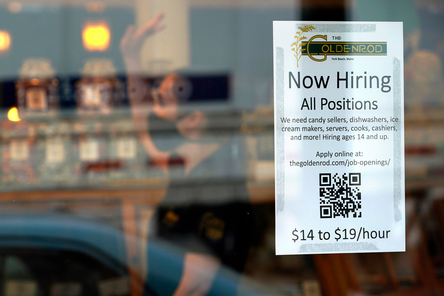 FILE - A sign advertises for help The Goldenrod, a popular restaurant and candy shop, Wednesday, June 1, 2022, in York Beach, Maine. America‚Äôs hiring boom continued in July as employers added a surprising 528,000 jobs despite raging inflation and rising anxiety about a recession.  (AP Photo/Robert F. Bukaty)