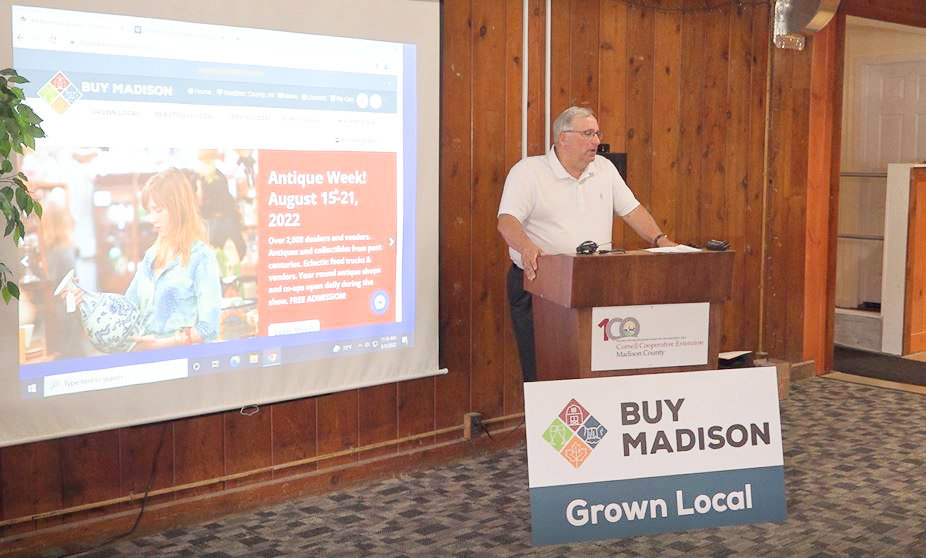 Madison County Chairman John Becker introduces Buy Madison County’s new website, showing residents where products like milk, bread and produce come from.