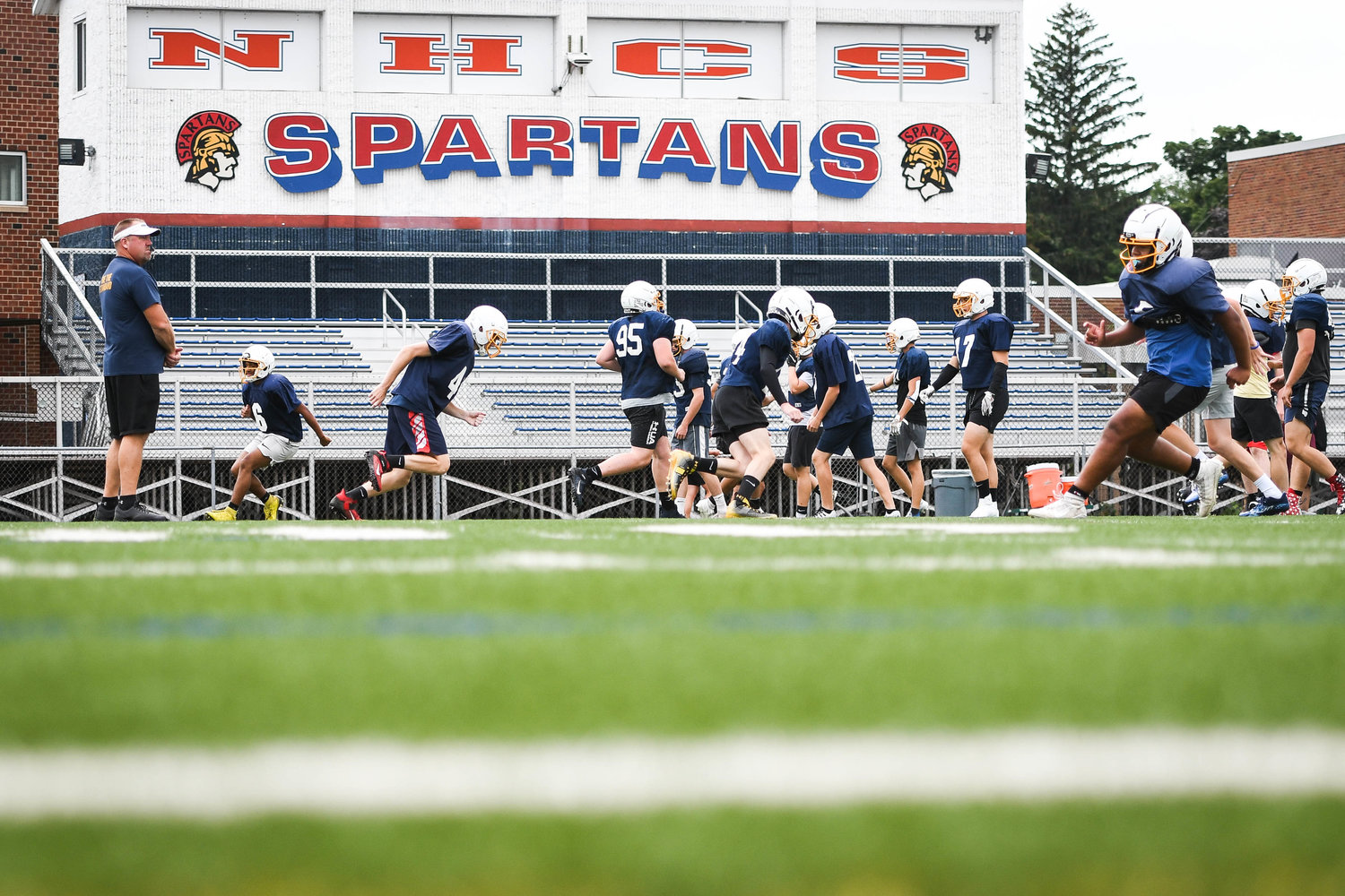 IT'S FOOTBALL SEASON — Central Valley Academy players warm up at the beginning of a seven-on-seven football camp on Tuesday at Don Edick Field in New Hartford. The Thunder start the 2022 season hosting Fonda-Fultonville at 6:30 p.m. on Friday, Sept. 2, at Diss Athletic Complex.