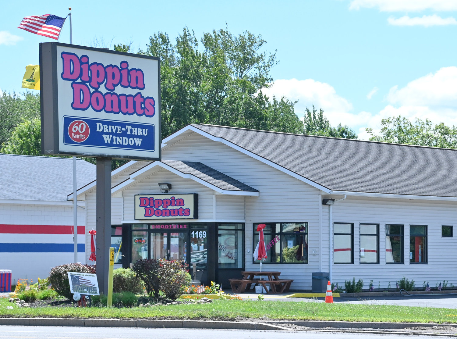The exterior of Dippin Donuts, 1169 Erie Blvd., is shown on Fridayl. Dippin Donuts owner John Zourdos attempted to postpone his upcoming prison sentence for nearly an entire year because he specifically wanted a male family member available to lift heavy bags of flour at 4 a.m., according to motions filed in Federal Court.