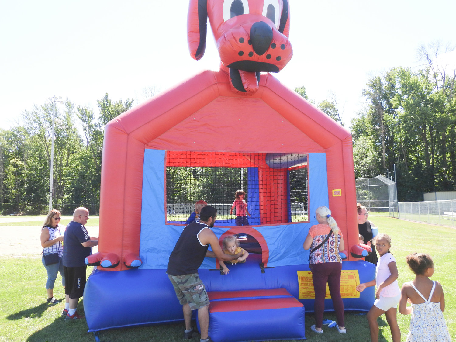 Local residents enjoy a day of fun at Wanderers' Rest's 2022 Woofstock fundraiser in Oneida on Saturday, Aug. 13.