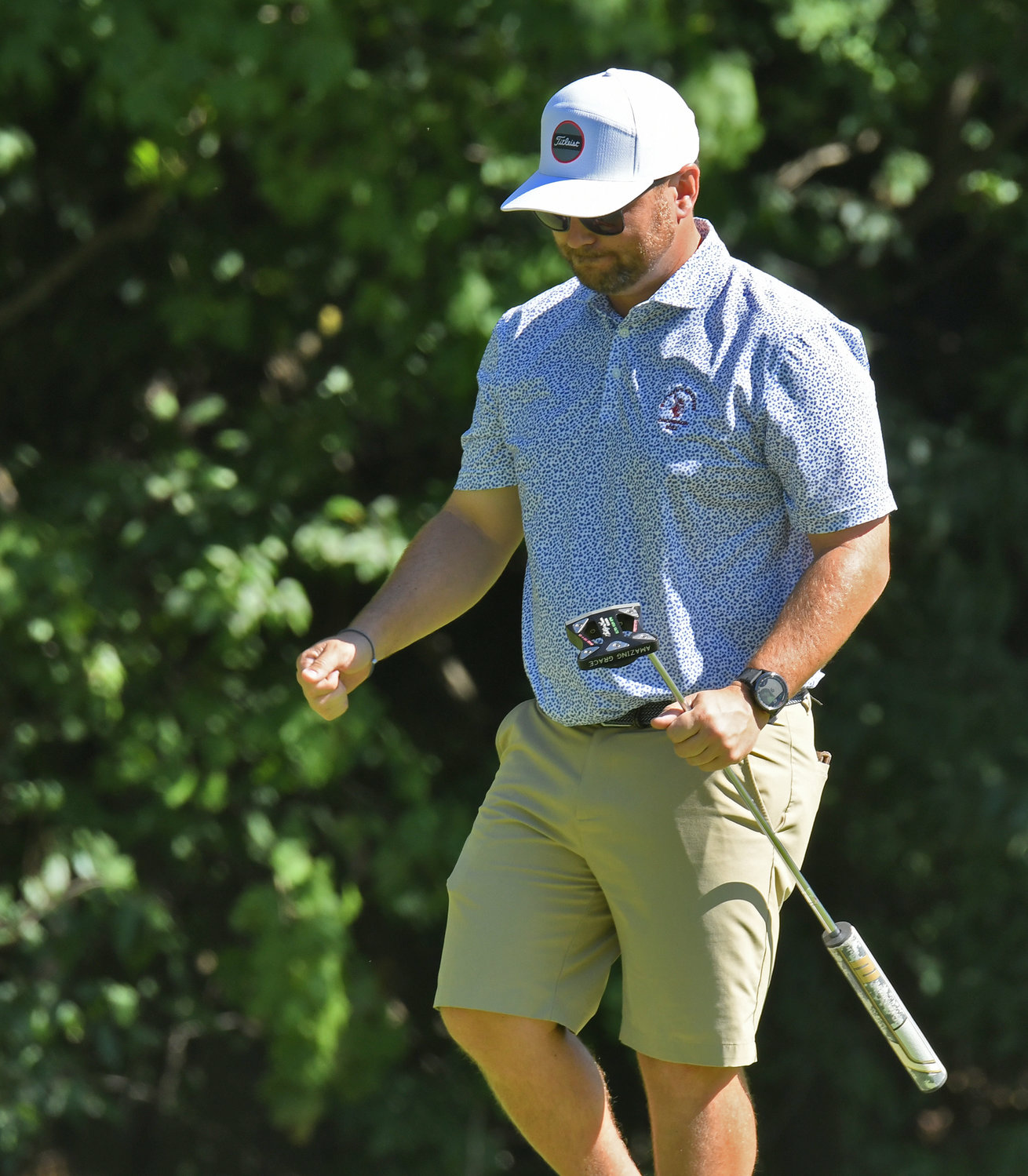 Ryan Borruso reacts with a little fist pump after making a birdie putt on the par 5 15th hole on Sunday afternoon at McConnellsville Country Club during the final round of the Rome City Men’s Amateur Golf Championship. Borruso won his third straight city title and fifth overall.