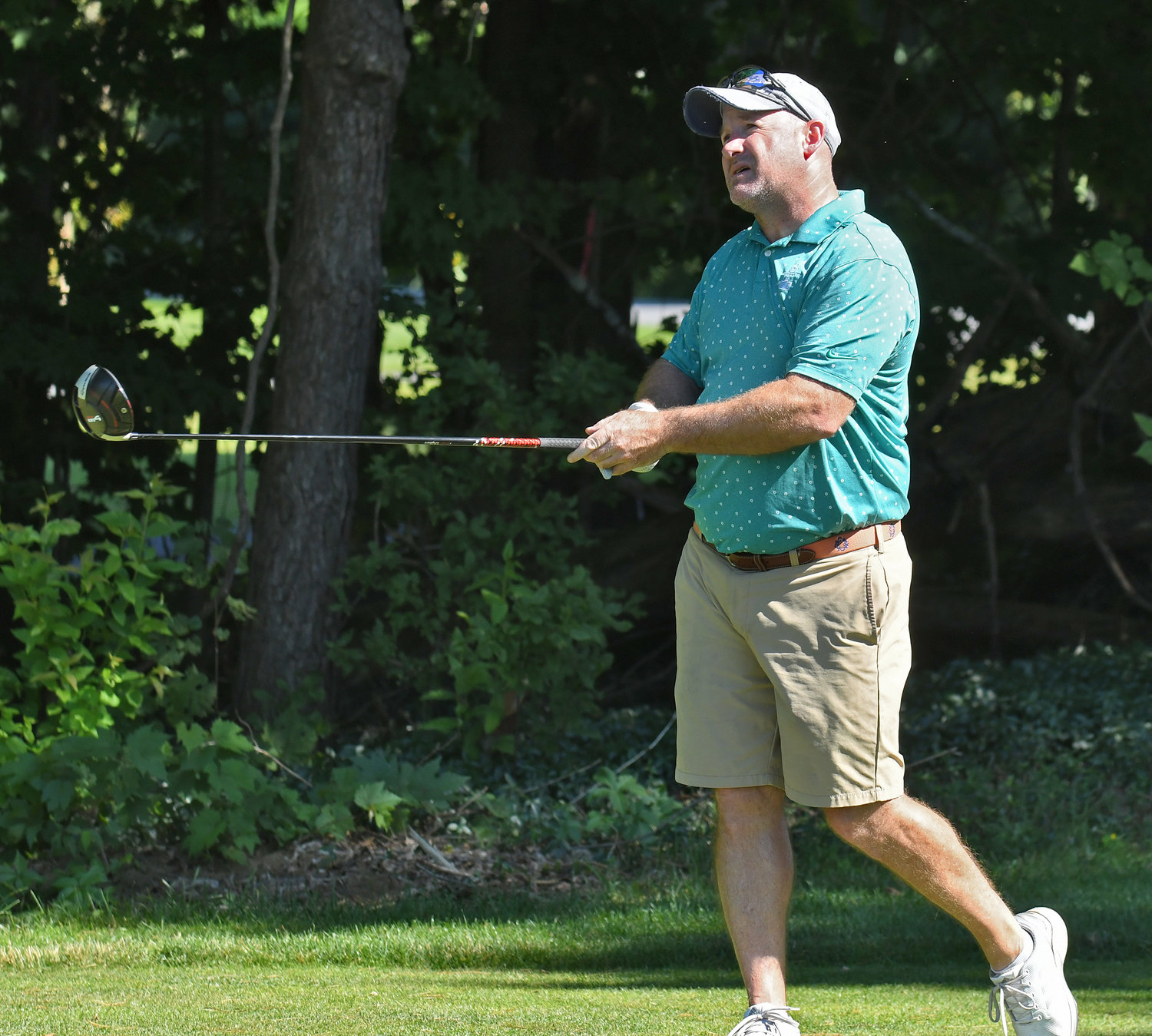 Chris McMahon hits a drive on the par 4 16th hole on Sunday afternoon at McConnellsville Country Club during the final round of the Rome City Men's Amateur Golf Championship. McMahon finished fourth with a two-day score of 157.