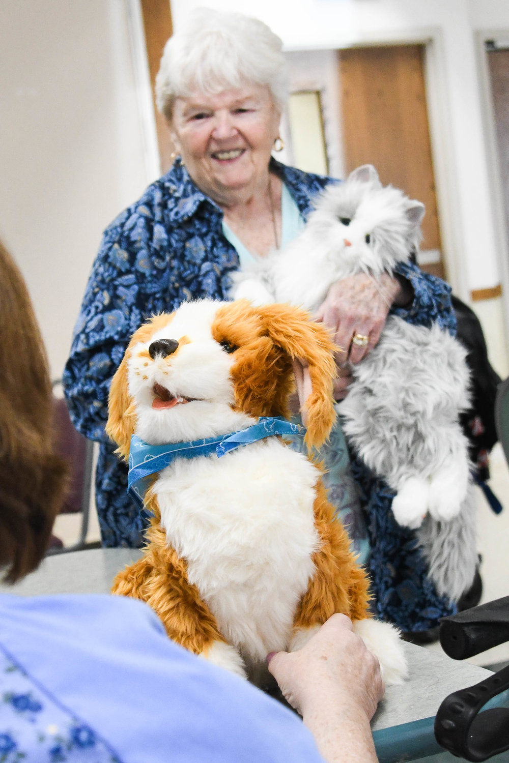 Members of the North Utica Senior Citizens Community Center hold animatronic animals on Friday. The center has received a grant from The Mele Family Fund and The Community Foundation of Herkimer and Oneida County to help battle loneliness using robotic pets. The two-pronged approach to mitigating social isolation, loneliness, and cognitive decline will include the animatronic pets and the promotion of social interaction using technology.
