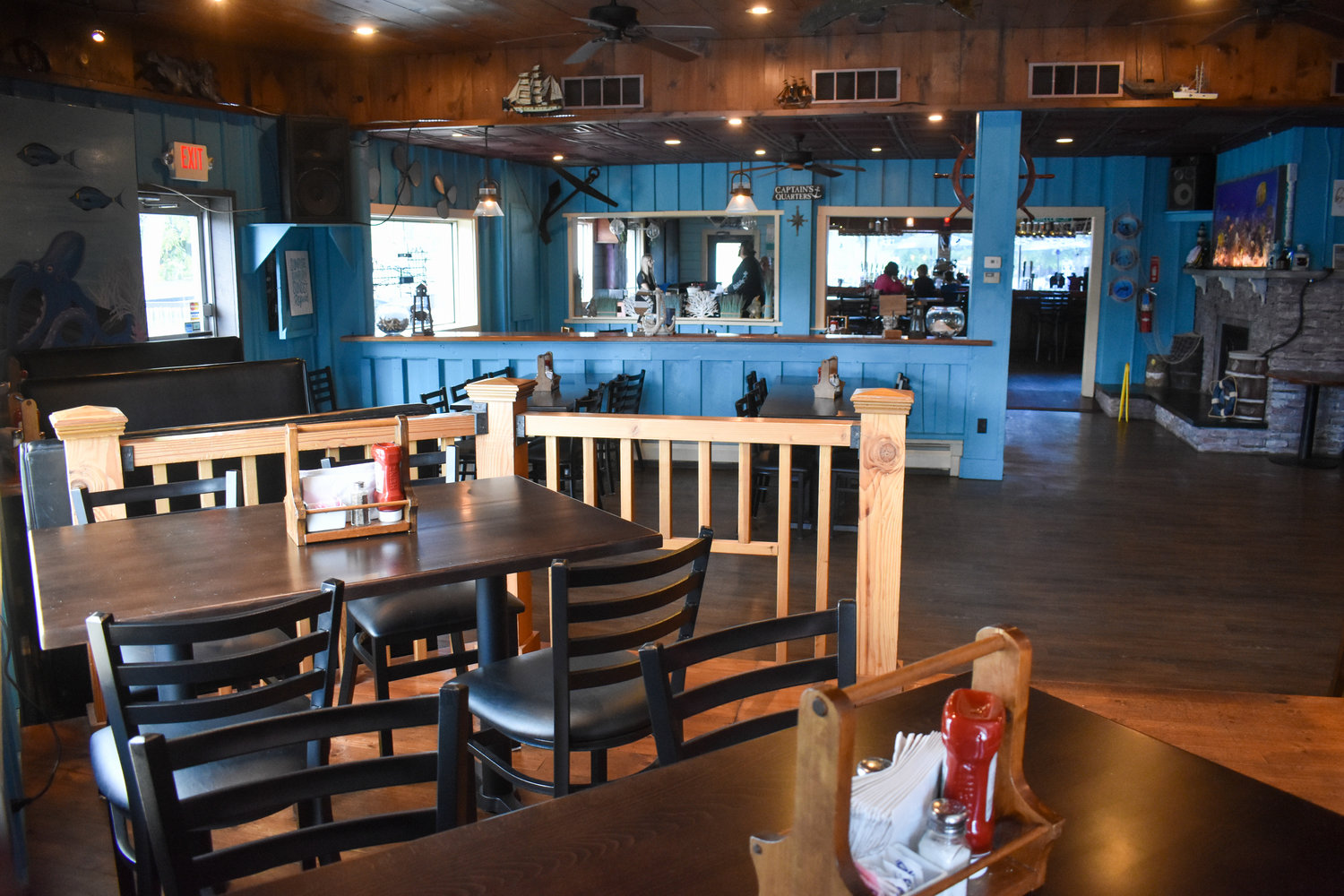 The interior of the Crazy Clam has been refreshed with new paint and beach-themed decor.