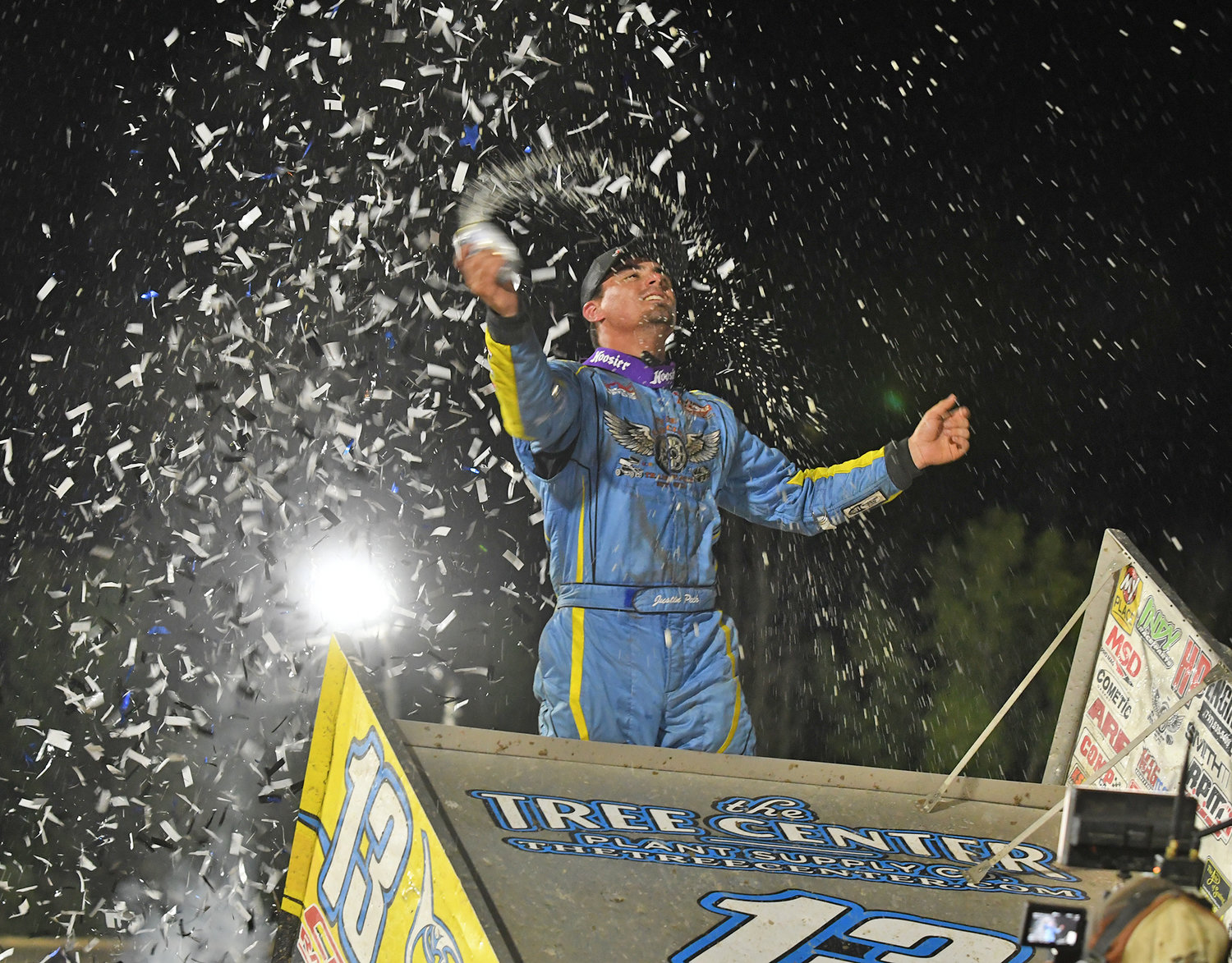 Justin Peck celebrates his Tezo All-Star series win Saturday night at Utica-Rome Speedway.