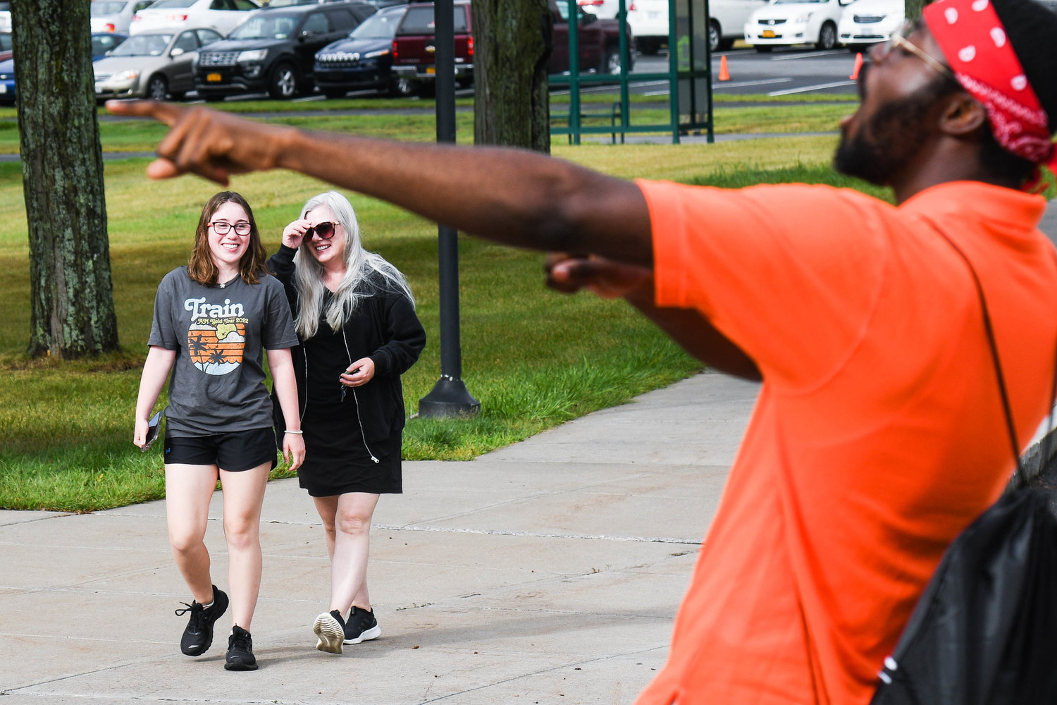A student directs a freshman in the right direction as student orientation members help Utica University’s Class of 2026 move into their dorms on Tuesday.