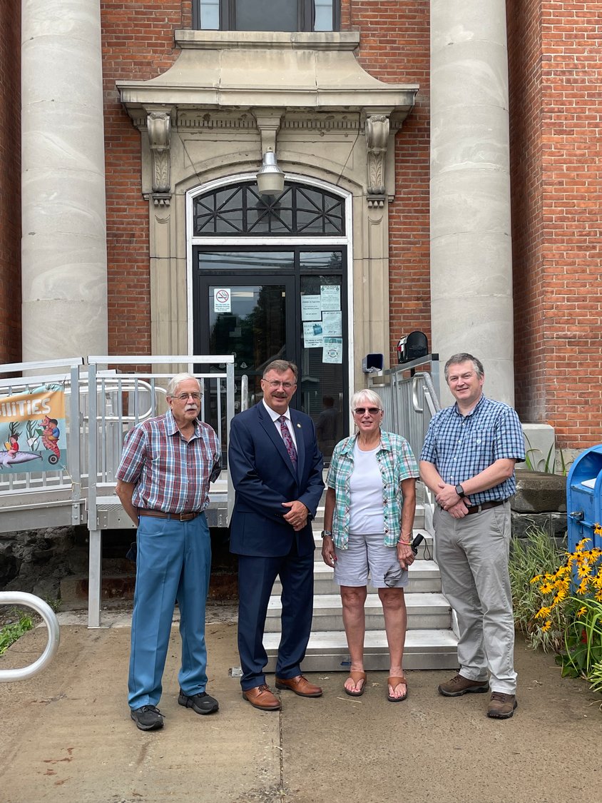 Assemblyman Brian Miller (R,C-New Hartford) visits the newly restored Bisby Hall in the Village of West Winfield with Mayor James Thompson and other officials on Aug. 22.
