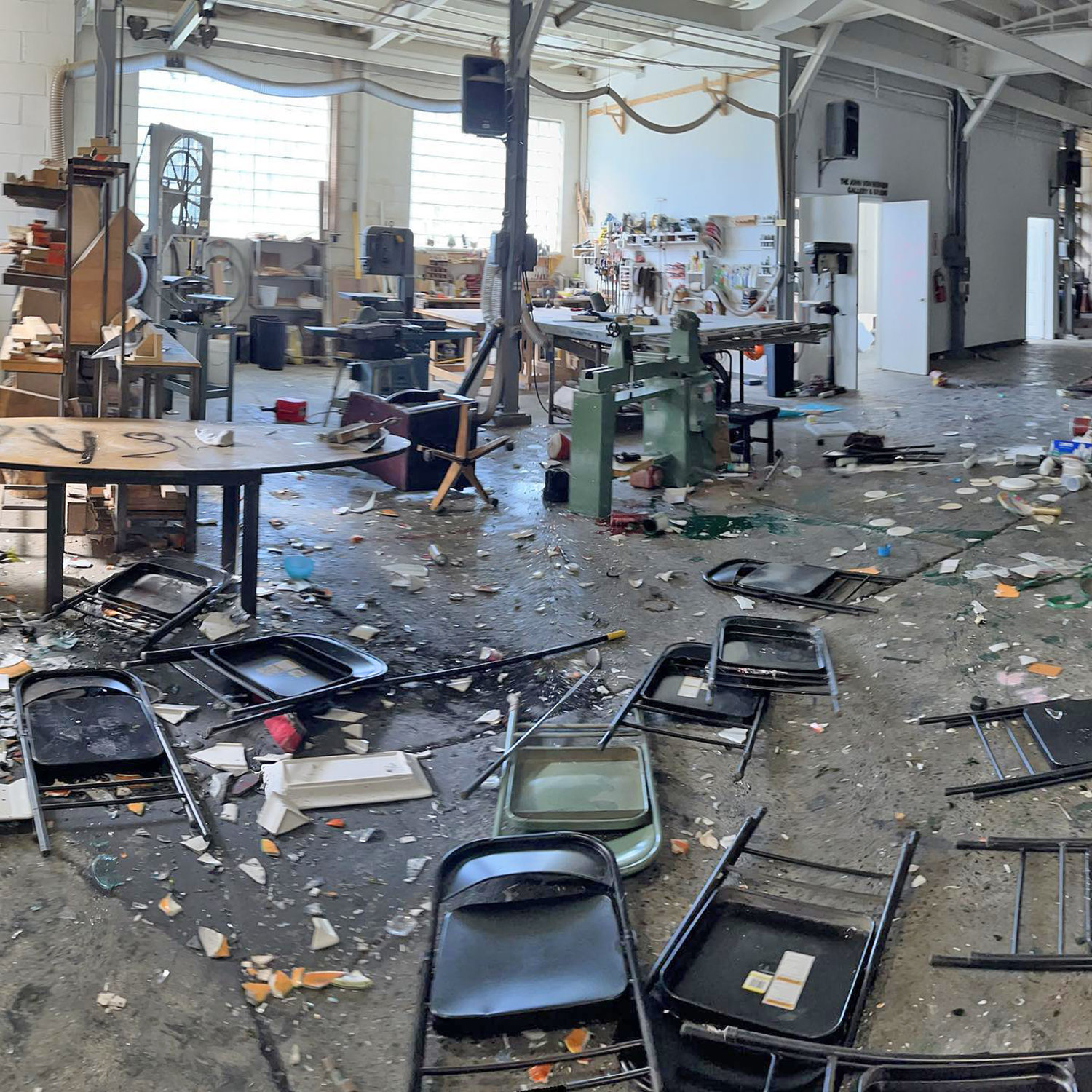 Smashed items and chairs are strewn about the Sculpture Space art studio on Gates Street in Utica on Sunday.