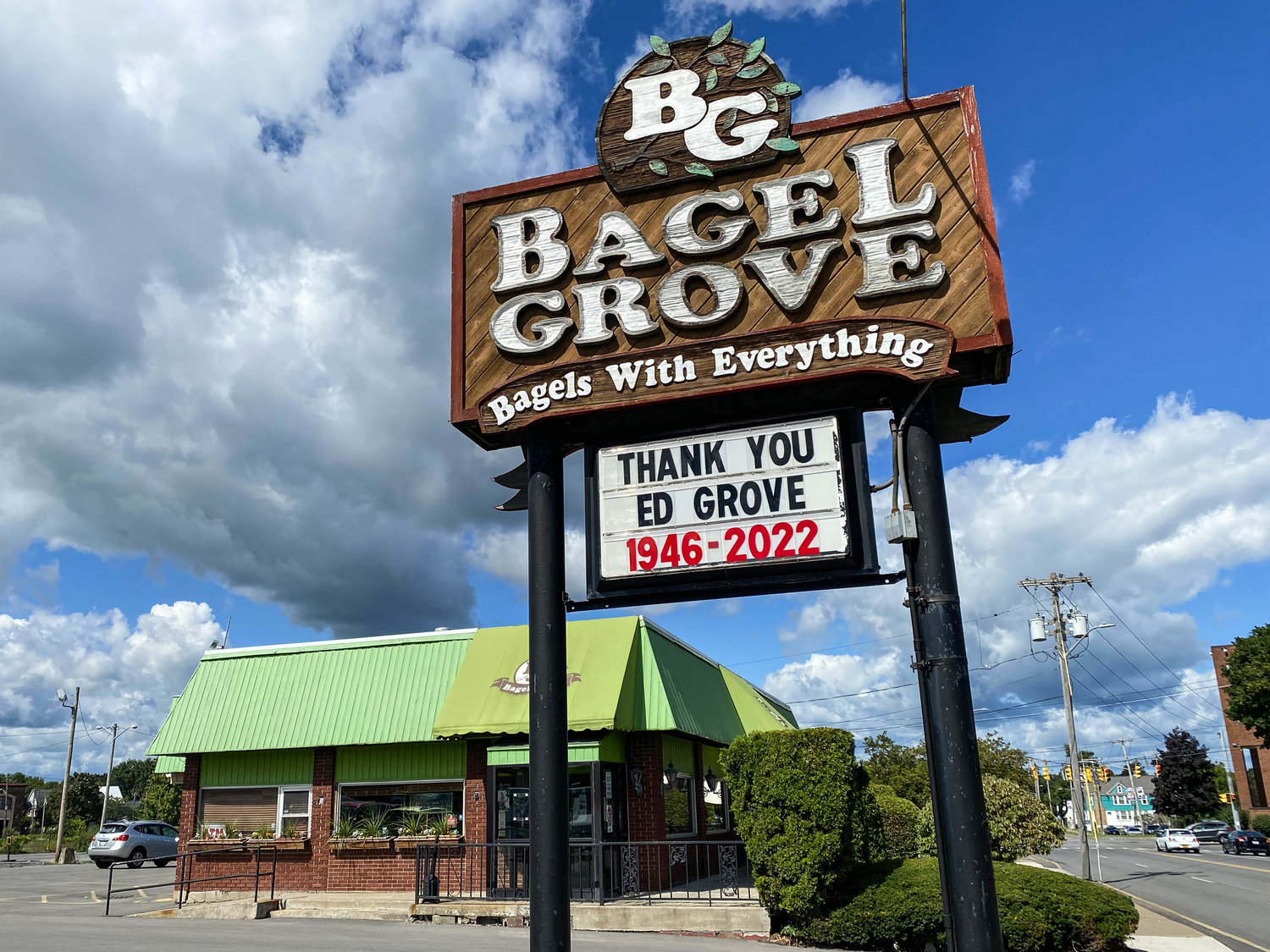 Bagel Grove, 7 Burrstone Road, Utica, honors Ed Grove, the founder of the authentic bagelry, on their sign outside the establishment.