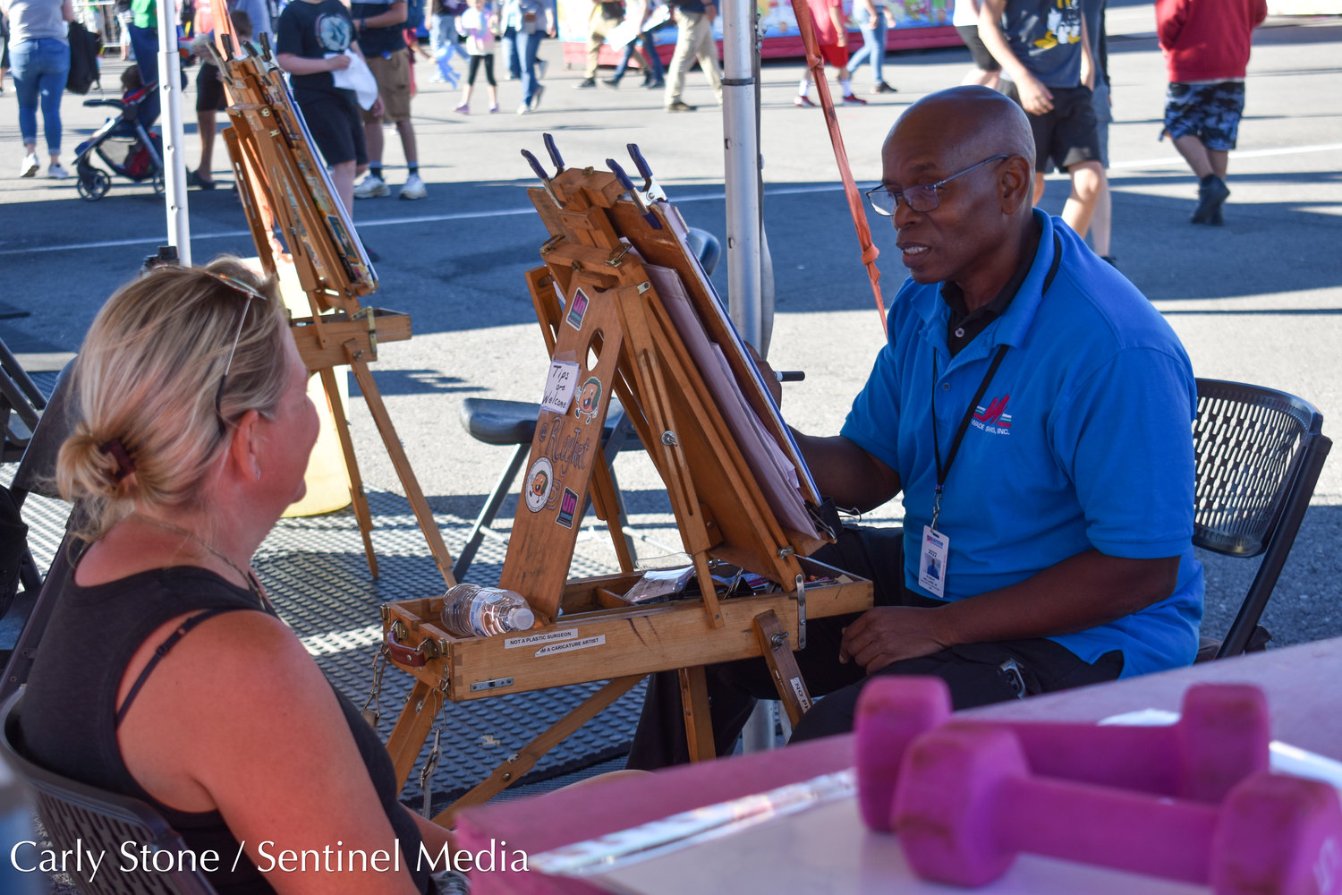 Rides not your thing? Sit down for a caricature drawing along the state fair midway.