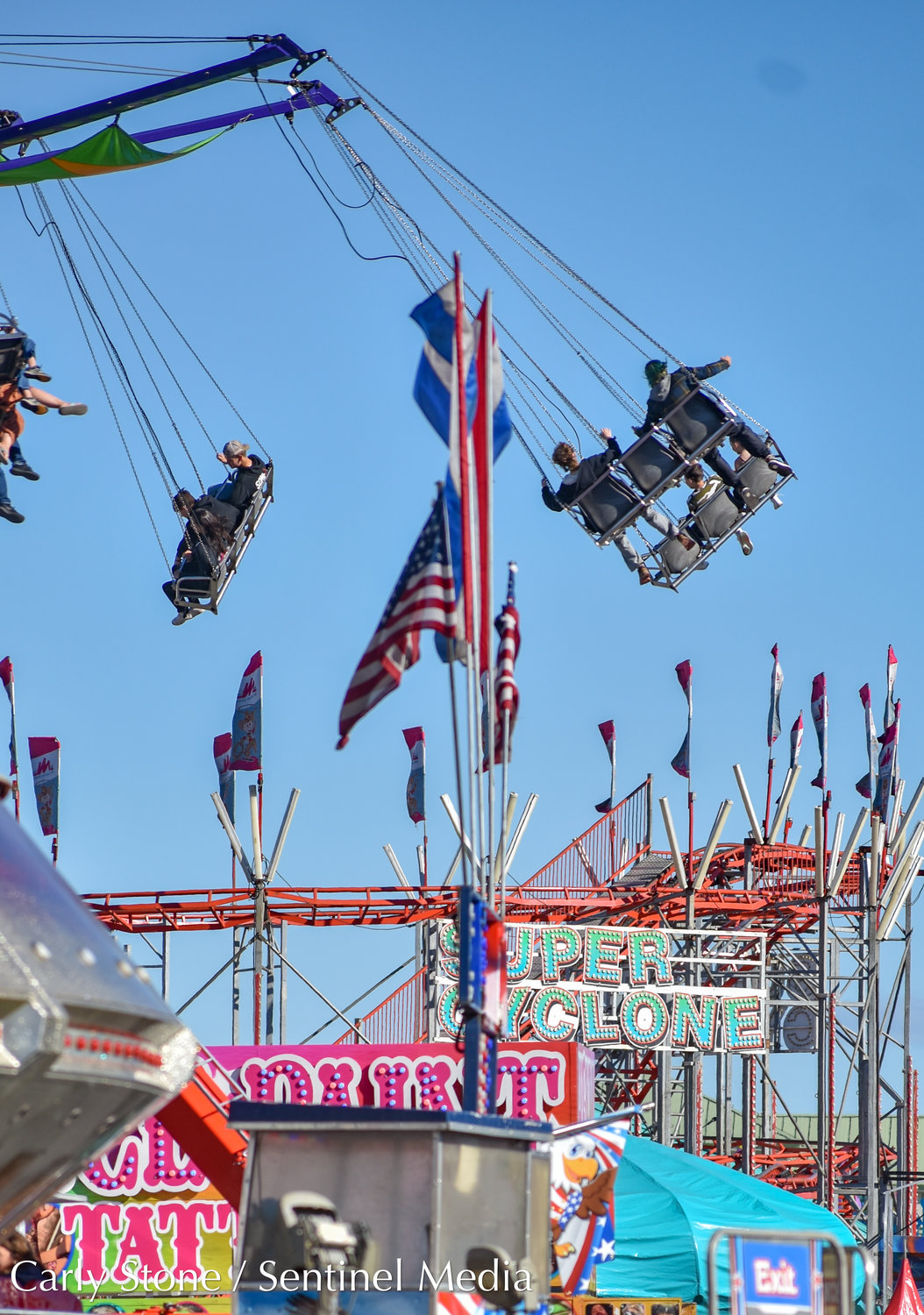 These swings offer a cool breeze and a bit of a thrill from so high up at the state fair.