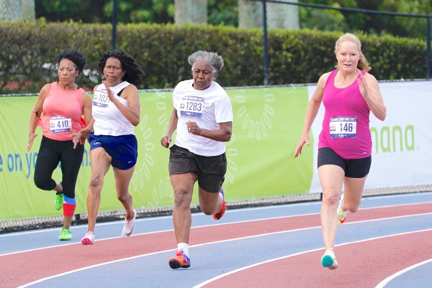 An over 60 years and older group of women run a 200 meter race during the National Senior Games, Monday, May 16, in Miramar, Fla.