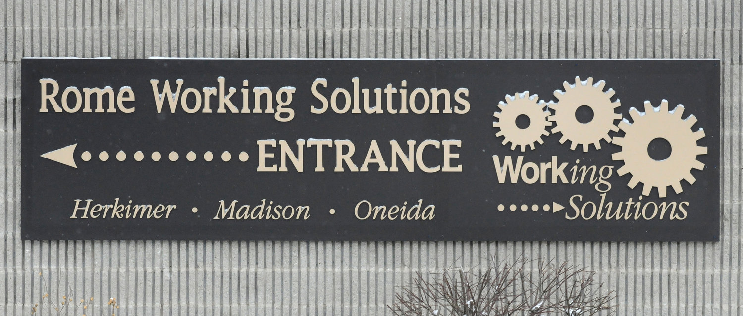 Signage on the exterior of Working Solutions, 300 W. Dominick St., Suite 1, points the way to the entrance. Although the agency’s door is locked, officials said, the office is open and a simple knock can help get the ball rolling for job seekers.