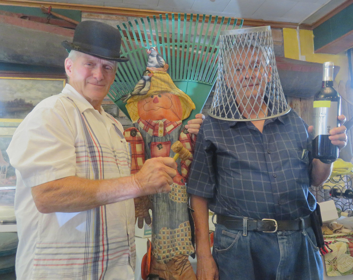 On Aug. 4, the Oriska Valley Seniors met at Quack's Village Inn in Madison for lunch followed by the annual auction of items brought in by members.  Entree choices for the BBQ luncheon were pulled pork, chicken fingers or cheeseburgers. Eric Howard and Mike Silliman conducted the auction. Pictured: Eric Howard, left, Mike Silliman.