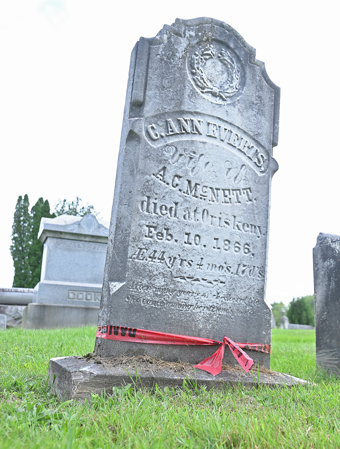 Headstone at the Oriskany Cemetery off Cider St. in the village that is very old and crooked and will be righted and reset along with many other headstones and monuments at the cemetery. Every monument that has a red ribbon on it will be fixed/corrected.