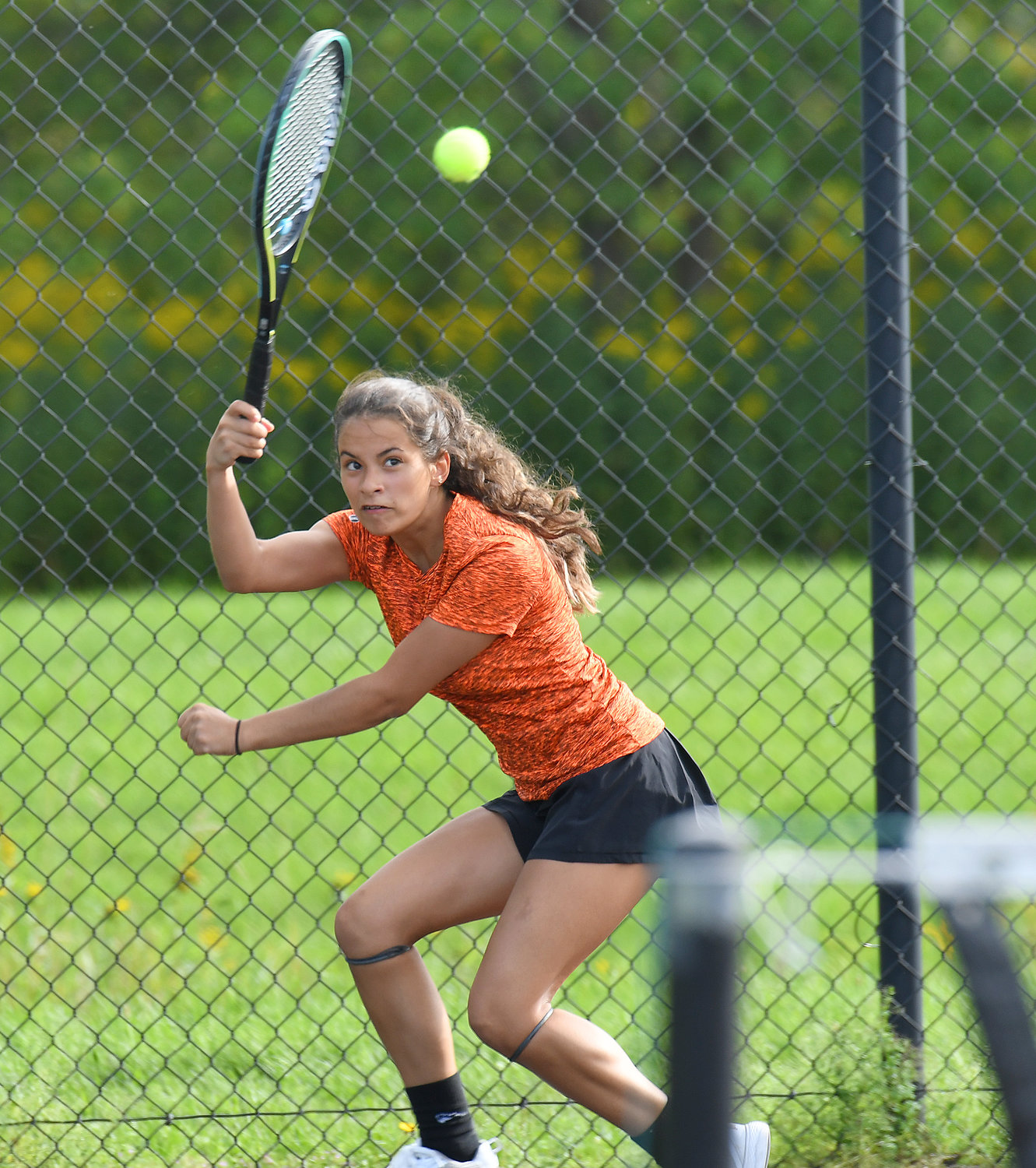 Rome Free Academy first singles player Jenna Cianfrocco returns a shot during her match Wednesday at home against Utica-Proctor’s Tha Kyet. She lost the match and the Black Knights lost 4-3.