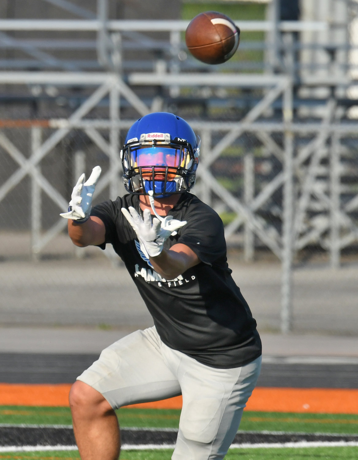 Camden senior receiver Robby Jackson watches the ball into his hands during a seven-on-seven scrimmage against Rome Free Academy.