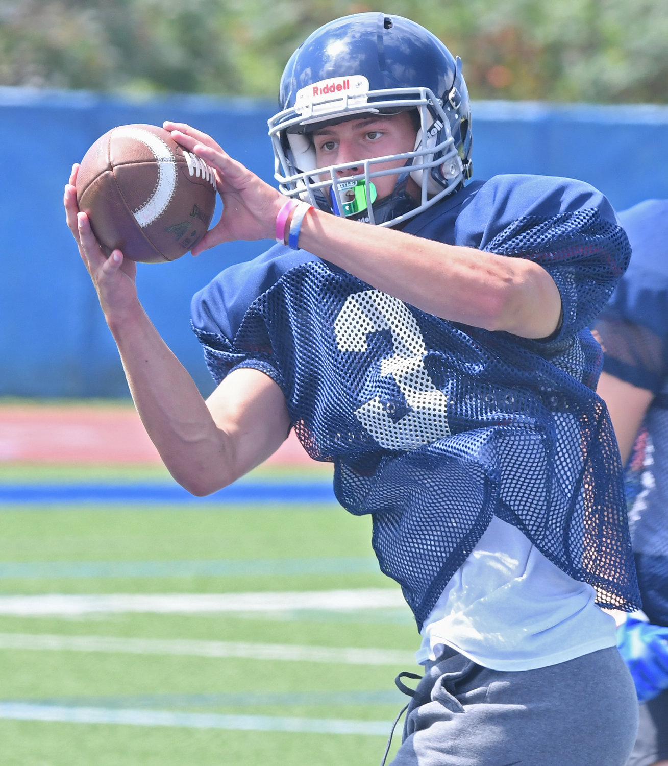 Whitesboro senior running back Nicholas Polnak watches the ball into his hands during practice at Edwin Wadas Athletic Complex. Polnak is one of three ball carriers who will get significant carries for the Warriors this fall.